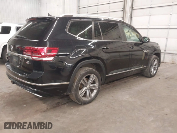 2018 Volkswagen Atlas SEL z VIN 1V2RR2CAXJC548261, wystawiony jako IAAI lot #41650478 z przebiegiem 123 399 mil mil oraz . Historia ofert i sprzedaży dostępna na DreamBid. Obrazek 4.