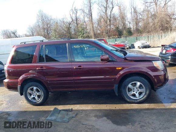 2007 Honda Pilot EX-L with VIN 5FNYF18647B004936, listed as a IAAI auction lot 41656465 with 225,580 mi miles and . Bid and sale history available at DreamBid. Image 14.