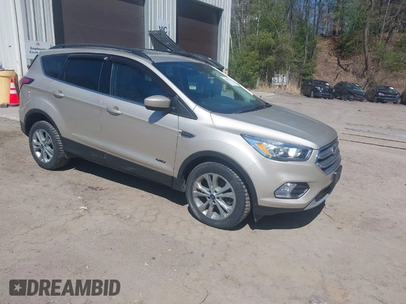 2017 Ford Escape SE with VIN 1FMCU9GD1HUD23228, listed as a IAAI auction lot 42074213 with 115,757 mi miles. Bid and sale history available at carsss.com. Image 1.