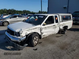 1999 Nissan Frontier XE with VIN 1N6DD26S0XC334058, listed as a Copart auction lot 56939115 with 342,622 mi miles and Salvage title. Bid and sale history available at DreamBid. Image 1.