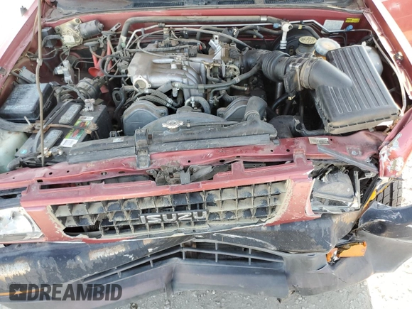 1997 Isuzu Rodeo z VIN 4S2CK58VXV4315798, wystawiony jako Copart lot #68860764 z przebiegiem 241 215 mil mil oraz Szkoda całkowita • Salvage title. Historia ofert i sprzedaży dostępna na DreamBid. Obrazek 12.