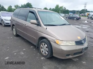 2003 Honda Odyssey EX-L with VIN 5FNRL180X3B151488, listed as a IAAI auction lot 42681426 with 231,065 mi miles and . Bid and sale history available at DreamBid. Image 1.