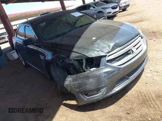 2014 Ford Taurus SEL with VIN 1FAHP2E82EG153430, listed as a IAAI auction lot 42022188 with 193,947 mi miles and . Bid and sale history available at DreamBid. Image 1.