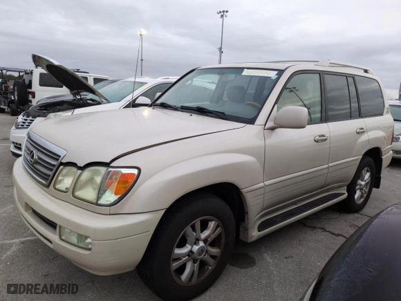 2004 Lexus LX 470 with VIN JTJHT00W243543558, listed as a Copart auction lot 74859974 with 189,556 mi miles and Salvage Title. Bid and sale history available at carsss.com. Image 1.