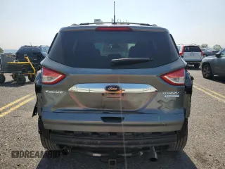 2014 Ford Escape Titanium с VIN 1FMCU0J96EUD41199, выставлен на аукционе Copart как лот 59380245 с пробегом 100 319 миль миль и Списание • Salvage title. История ставок и продаж доступна на DreamBid. Изображение 6.