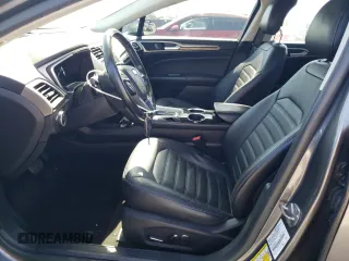 2013 Ford Fusion SE Hybrid z VIN 3FA6P0LUXDR362711, wystawiony jako Copart lot #57060425 z przebiegiem 155 031 mil mil oraz Szkoda całkowita • Salvage title. Historia ofert i sprzedaży dostępna na DreamBid. Obrazek 7.