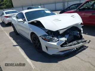 2019 Ford Mustang EcoBoost z VIN 1FA6P8TH4K5131093, wystawiony jako IAAI lot #42335837 z przebiegiem 101 244 mil mil oraz . Historia ofert i sprzedaży dostępna na DreamBid. Obrazek 1.