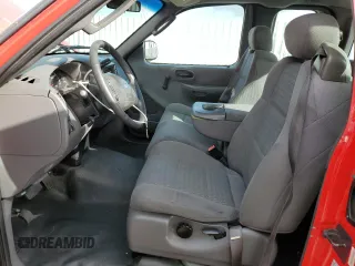 2003 Ford F-150 XL with VIN 1FTRX07213KB93777, listed as a Copart auction lot 46950285 with 176,332 mi miles and Salvage title. Bid and sale history available at DreamBid. Image 7.