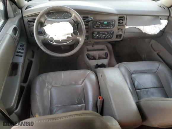 2001 Dodge Durango with VIN 1B4HS28Z21F637575, listed as a Copart auction lot 83012674 with 276,619 mi miles and Salvage Title. Bid and sale history available at carsss.com. Image 8.