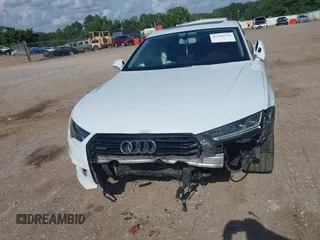 2016 Audi A7 Premium Plus with VIN WAUWGAFC2GN021696, listed as a IAAI auction lot 42595234 with 112,464 mi miles and . Bid and sale history available at DreamBid. Image 6.