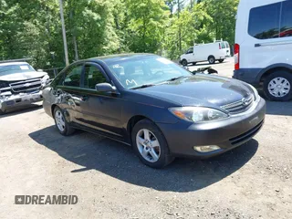 2002 Toyota Camry LE z VIN JTDBE32K020095947, wystawiony jako IAAI lot #42364984 z przebiegiem 198 756 mil mil oraz . Historia ofert i sprzedaży dostępna na DreamBid. Obrazek 1.