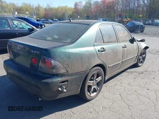 2002 Lexus IS 300 with VIN JTHBD192720040858, listed as a IAAI auction lot 42142644 with 147,956 mi miles. Bid and sale history available at carsss.com. Image 4.