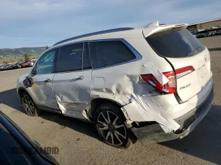 2020 Honda Pilot Touring 7-Passenger z VIN 5FNYF6H68LB002405, wystawiony jako Copart lot #46857625 z przebiegiem 69 617 mil mil oraz Szkoda całkowita • Salvage title. Historia ofert i sprzedaży dostępna na DreamBid. Obrazek 2.
