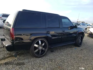1999 Cadillac Escalade z VIN 1GYEK13R7XR405790, wystawiony jako Copart lot #84478384 z przebiegiem 244 195 mil mil oraz Szkody całkowita. Historia ofert i sprzedaży dostępna na DreamBid. Obrazek 3.