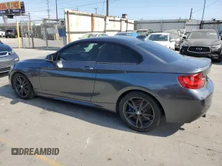 2016 BMW 2 Series M235i with VIN WBA1J7C52GV359958, listed as a Copart auction lot 65937374 with 82,231 mi miles and Salvage title. Bid and sale history available at DreamBid. Image 2.