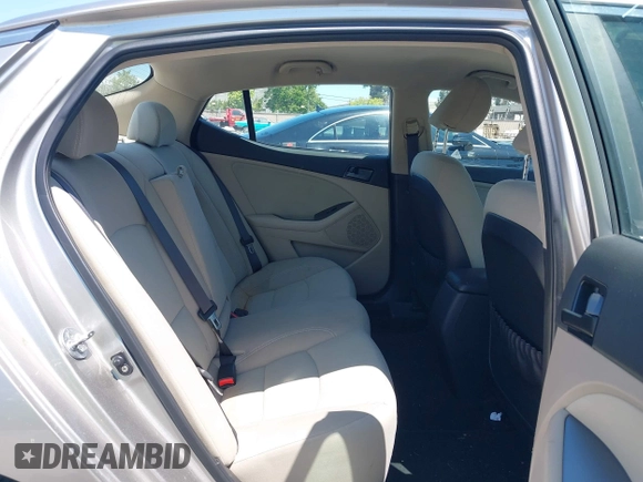 2013 Kia Optima LX with VIN KNAGM4A72D5399117, listed as a IAAI auction lot 42174312 with 105,661 mi miles and . Bid and sale history available at carsss.com. Image 8.