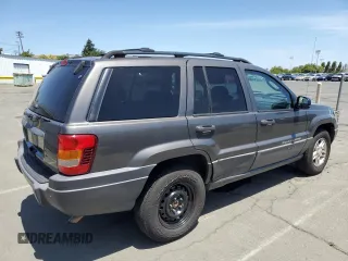 2004 Jeep Grand Cherokee Laredo with VIN 1J4GW48S54C430857, listed as a Copart auction lot 62744305 with 122,099 mi miles and Salvage title. Bid and sale history available at DreamBid. Image 3.
