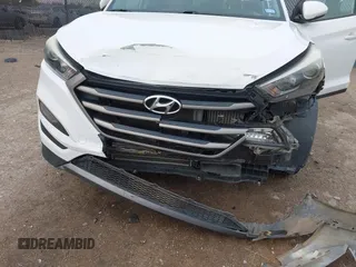 2016 Hyundai Tucson Sport with VIN KM8J33A2XGU242256, listed as a IAAI auction lot 41065573 with 97,503 mi miles. Bid and sale history available at carsss.com. Image 6.