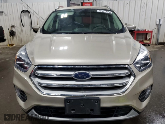 2018 Ford Escape Titanium с VIN 1FMCU9J93JUC08799, выставлен на аукционе Copart как лот 48961795 с пробегом 78 127 миль миль и Списание • Salvage title. История ставок и продаж доступна на DreamBid. Изображение 5.