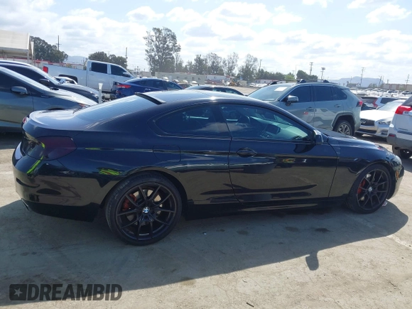 2013 BMW 6 Series 650i with VIN WBAYM9C57DDW20178, listed as a IAAI auction lot 41933561 with 72,886 mi miles and . Bid and sale history available at carsss.com. Image 14.