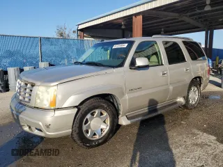2004 Cadillac Escalade z VIN 1GYEC63T94R208993, wystawiony jako Copart lot #87224664 z przebiegiem 285 642 mil mil oraz Szkody całkowita. Historia ofert i sprzedaży dostępna na DreamBid. Obrazek 1.