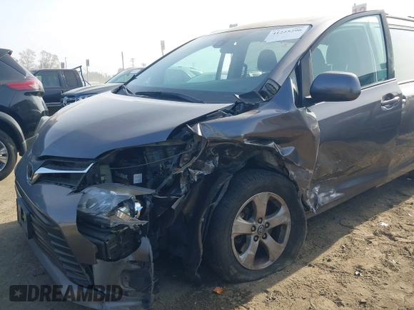2019 Toyota Sienna LE Auto Access Seat with VIN 5TDKZ3DC4KS987948, listed as a IAAI auction lot 41225296 with 104,189 mi miles and . Bid and sale history available at DreamBid. Image 6.