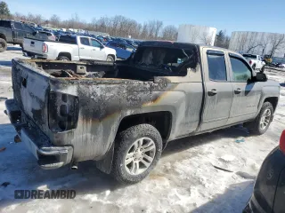 2017 Chevrolet Silverado 1500 LT with VIN 1GCVKREC7HZ193021, listed as a Copart auction lot 48047275 with 107,429 mi miles and Salvage Title. Bid and sale history available at DreamBid. Image 3.