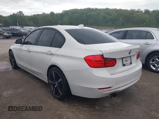2012 BMW 3 Series 328i with VIN WBA3A5G57CNP16102, listed as a IAAI auction lot 42088407 with 70,608 mi miles and . Bid and sale history available at carsss.com. Image 3.