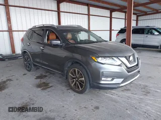 2018 Nissan Rogue SV with VIN JN8AT2MT9JW485804, listed as a IAAI auction lot 41711723 with 74,860 mi miles and . Bid and sale history available at carsss.com. Image 1.