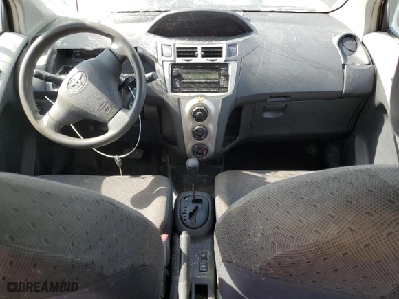 2009 Toyota Yaris with VIN JTDKT903095229132, listed as a Copart auction lot 51512655 with 183,963 mi miles and Salvage Title. Bid and sale history available at carsss.com. Image 8.