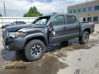 2019 Toyota Tacoma SR with VIN 3TMCZ5AN1KM269621, listed as a Copart auction lot 62414885 with 64,597 mi miles and Salvage title. Bid and sale history available at DreamBid. Image 1.