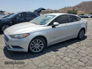 2017 Ford Fusion Hybrid SE с VIN 3FA6P0LU2HR381372, выставлен на аукционе Copart как лот 64771975 с пробегом 128 528 миль миль и Чистый • Clean title. История ставок и продаж доступна на DreamBid. Изображение 1.
