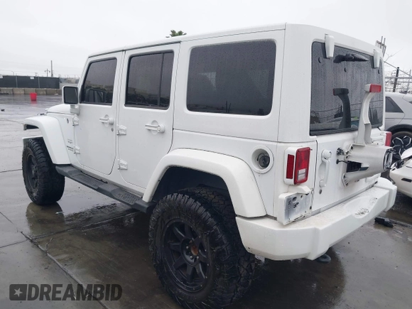 2016 Jeep Wrangler Unlimited Sahara with VIN 1C4HJWEG8GL240950, listed as a IAAI auction lot 41443059 with Not provided miles and . Bid and sale history available at DreamBid. Image 3.
