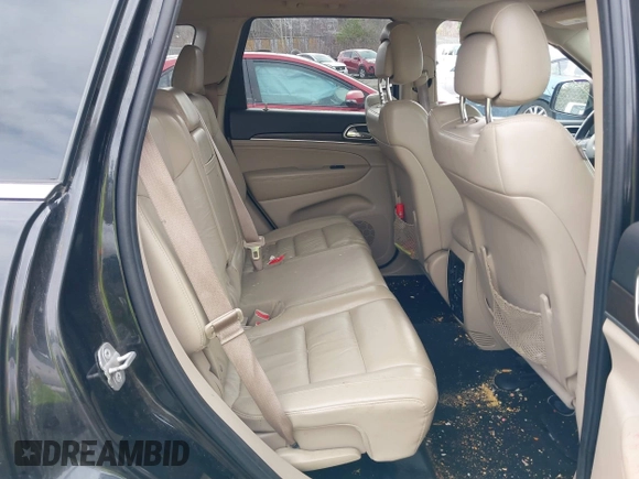 2014 Jeep Grand Cherokee Limited z VIN 1C4RJFBG0EC297746, wystawiony jako IAAI lot #41956879 z przebiegiem 212 106 mil mil oraz . Historia ofert i sprzedaży dostępna na DreamBid. Obrazek 8.