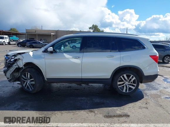 2017 Honda Pilot Elite with VIN 5FNYF6H06HB041609, listed as a IAAI auction lot 41804477 with 134,535 mi miles and . Bid and sale history available at DreamBid. Image 15.
