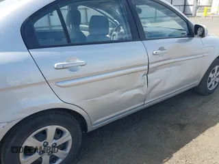 2010 Hyundai Accent GLS with VIN KMHCN4AC1AU476326, listed as a IAAI auction lot 42141297 with 203,607 mi miles. Bid and sale history available at carsss.com. Image 6.