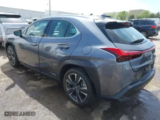 2021 Lexus UX with VIN JTHP9JBH1M2040593, listed as a IAAI auction lot 42024493 with 33,394 mi miles. Bid and sale history available at carsss.com. Image 3.