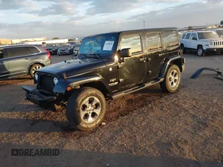 2018 Jeep Wrangler JK Unlimited Sahara with VIN 1C4HJWEG0JL810480, listed as a IAAI auction lot 41260609 with 69,776 mi miles. Bid and sale history available at carsss.com. Image 2.