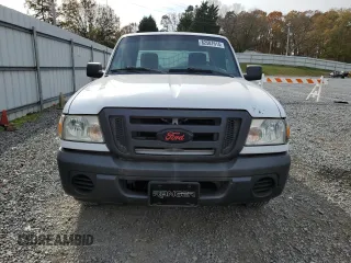 2010 Ford Ranger with VIN 1FTLR1EE1APA37032, listed as a Copart auction lot 82587614 with 215,440 mi miles and Salvage Title. Bid and sale history available at DreamBid. Image 5.