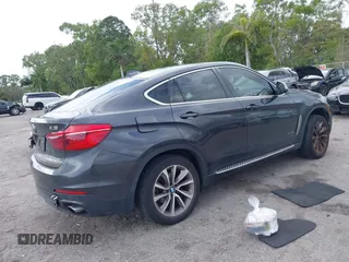 2015 BMW X6 xDrive35i z VIN 5UXKU2C59F0N76242, wystawiony jako IAAI lot #41714644 z przebiegiem 170 851 mil mil oraz . Historia ofert i sprzedaży dostępna na DreamBid. Obrazek 4.