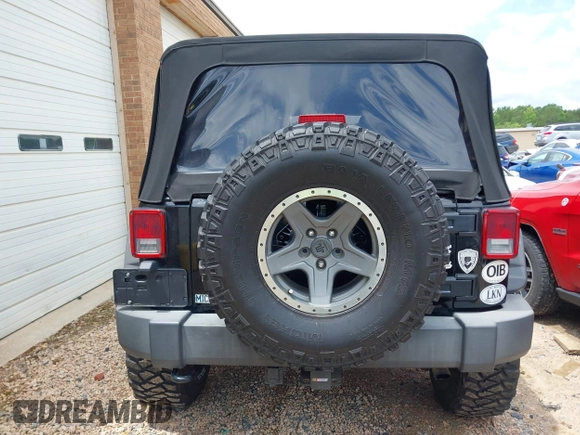 2015 Jeep Wrangler Unlimited Rubicon with VIN 1C4BJWFG4FL566862, listed as a IAAI auction lot 42310901 with 146,206 mi miles and . Bid and sale history available at DreamBid. Image 16.