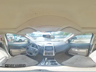 2008 Ford Edge SEL z VIN 2FMDK38C08BA37731, wystawiony jako Copart lot #55872035 z przebiegiem 196 943 mil mil oraz Szkoda całkowita • Salvage title. Historia ofert i sprzedaży dostępna na DreamBid. Obrazek 16.