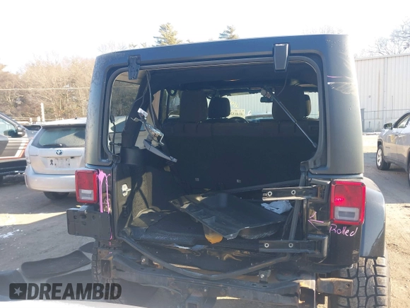 2018 Jeep Wrangler JK Unlimited Sahara with VIN 1C4HJWEG8JL921293, listed as a IAAI auction lot 41413264 with 90,566 mi miles. Bid and sale history available at carsss.com. Image 17.