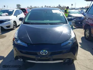 2021 Toyota Prius L Eco with VIN JTDKAMFU3M3148574, listed as a IAAI auction lot 41624303 with 89,747 mi miles. Bid and sale history available at carsss.com. Image 12.