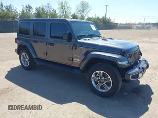 2018 Jeep Wrangler Unlimited Sahara z VIN 1C4HJXEG0JW166645, wystawiony jako IAAI lot #42228492 z przebiegiem 58 416 mil mil oraz . Historia ofert i sprzedaży dostępna na DreamBid. Obrazek 1.