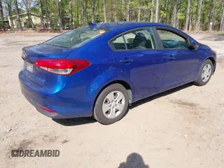 2017 Kia Forte LX with VIN 3KPFK4A70HE052223, listed as a IAAI auction lot 42036382 with 136,671 mi miles. Bid and sale history available at carsss.com. Image 4.