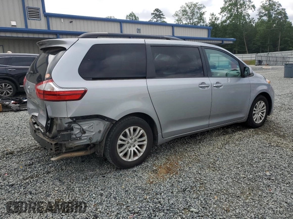 2016 Toyota Sienna XLE with VIN 5TDYK3DC8GS715148, listed as a Copart auction lot 57834045 with 128,769 mi miles and Salvage title. Bid and sale history available at DreamBid. Image 3.