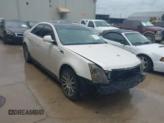 2011 Cadillac CTS with VIN 1G6DA5EY3B0100660, listed as a IAAI auction lot 42521160 with 228,093 mi miles and . Bid and sale history available at DreamBid. Image 1.
