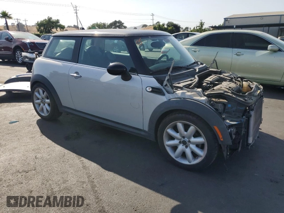 2013 MINI Hardtop with VIN WMWSU3C58DT371379, listed as a Copart auction lot 59606005 with 59,901 mi miles and Salvage title. Bid and sale history available at DreamBid. Image 4.