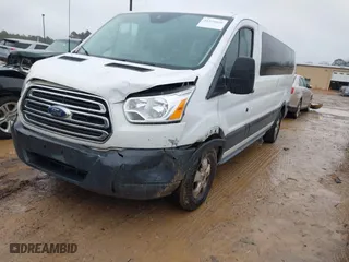 2018 Ford Transit Passenger Wagon XL with VIN 1FBZX2ZM8JKA48229, listed as a IAAI auction lot 41571026 with NaN miles. Bid and sale history available at carsss.com. Image 17.